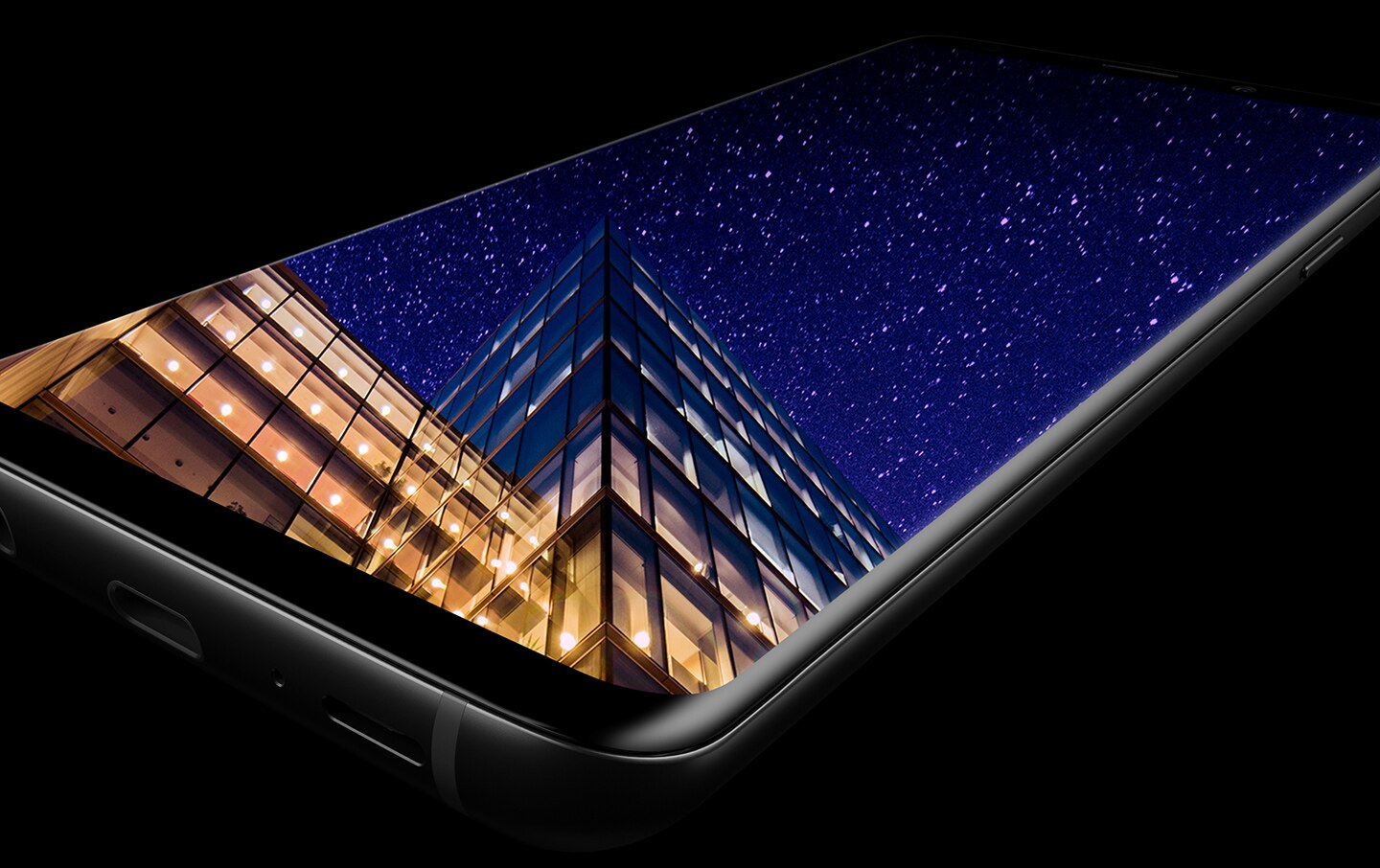 Galaxy S9 or S9+ laying flat to show the Infinity Display with an image on-screen
