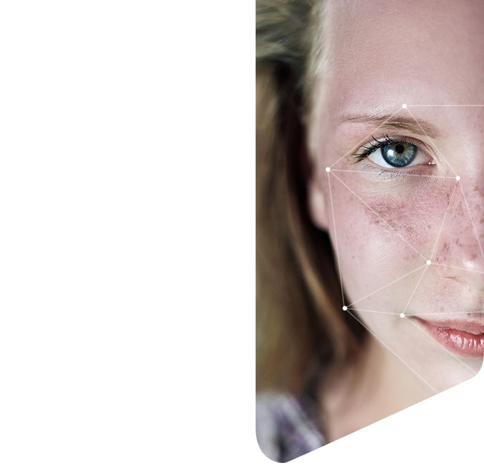 Person’s face with illustrated overlays depicting face recognition and iris scan