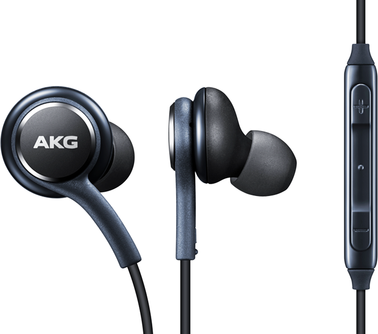 Close-up of earphones tuned by AKG showing earbuds and volume control
