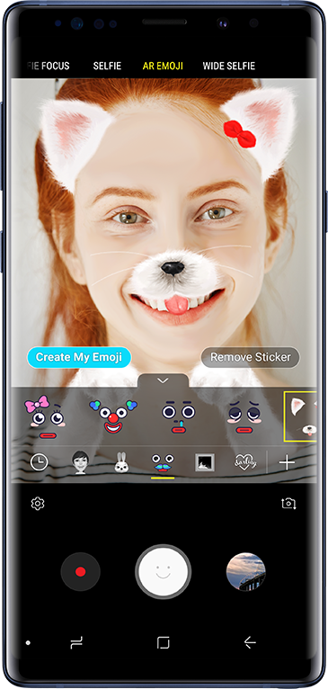 An image of a Galaxy Note9 Ocean Blue, showing how an on-screen photo can be decorated using stickers and effects.