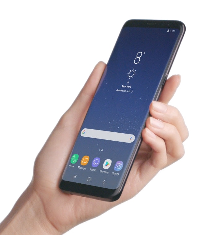Image d'une main gauche tenant un Galaxy S9 Midnight Black