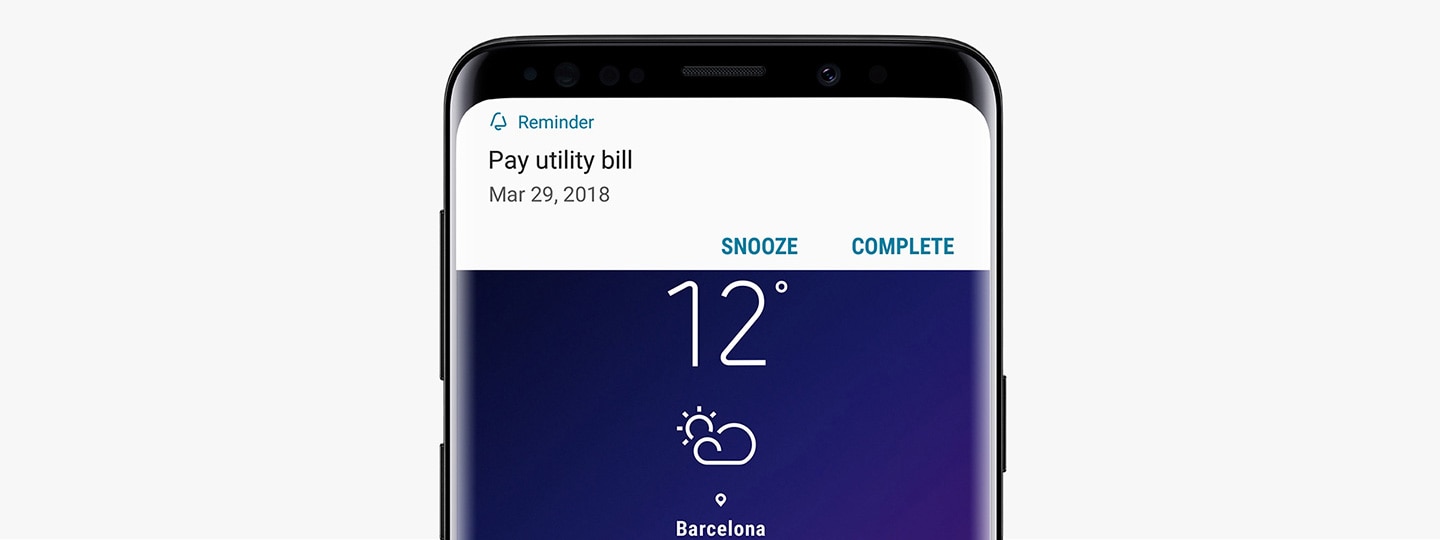 빅스비 리마인더를 통해 '공과금 납부' 알림을 받는 Galaxy S9 미드나잇 블랙의 이미지입니다.