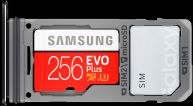 Entirely ejected SIM tray holding a SIM card and a Samsung 256GB microSD card