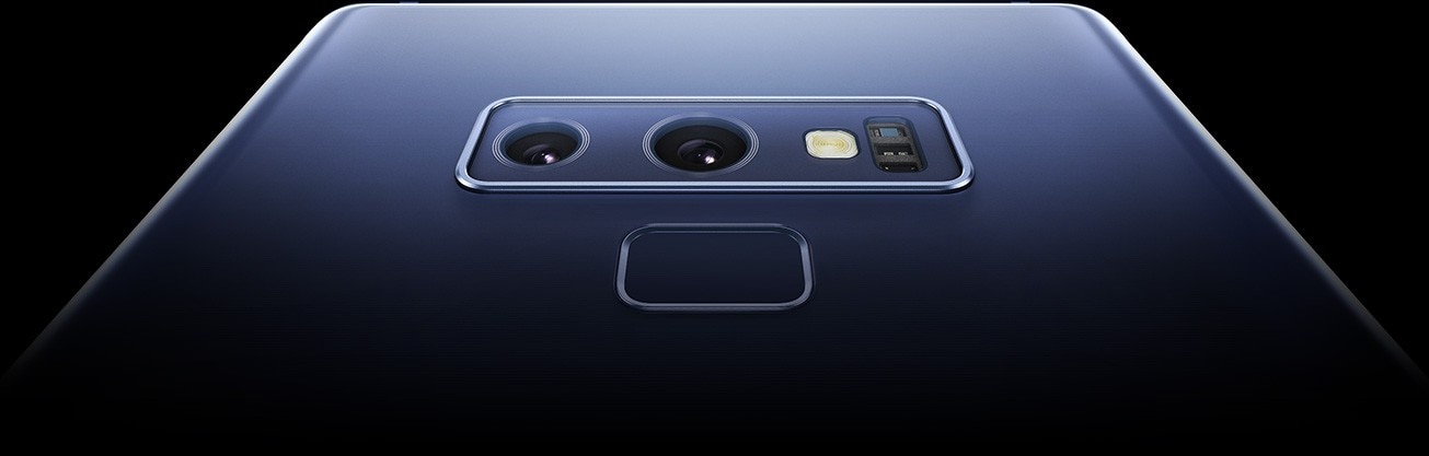 An extreme closeup of Galaxy Note9âs dual lens rear camera and fingerprint scanner