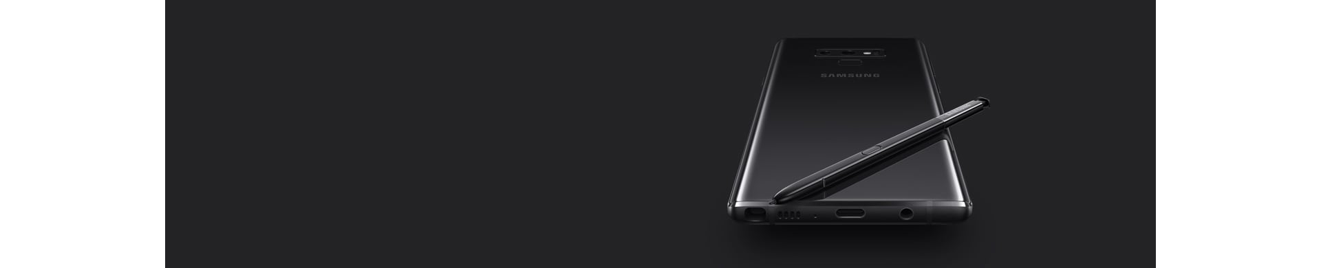 Galaxy Note9 preto meia-noite com o ecrã para baixo com S Pen preta no topo, visto de baixo